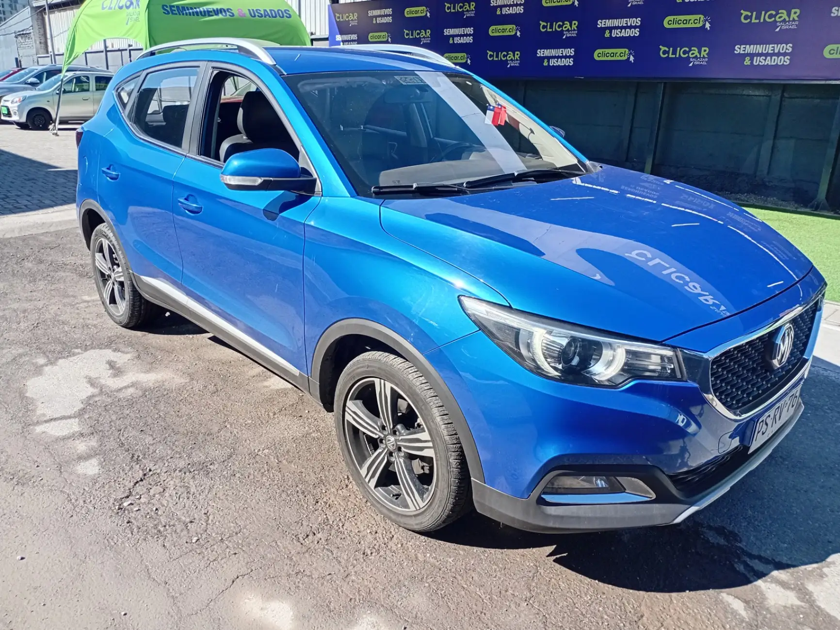 MG