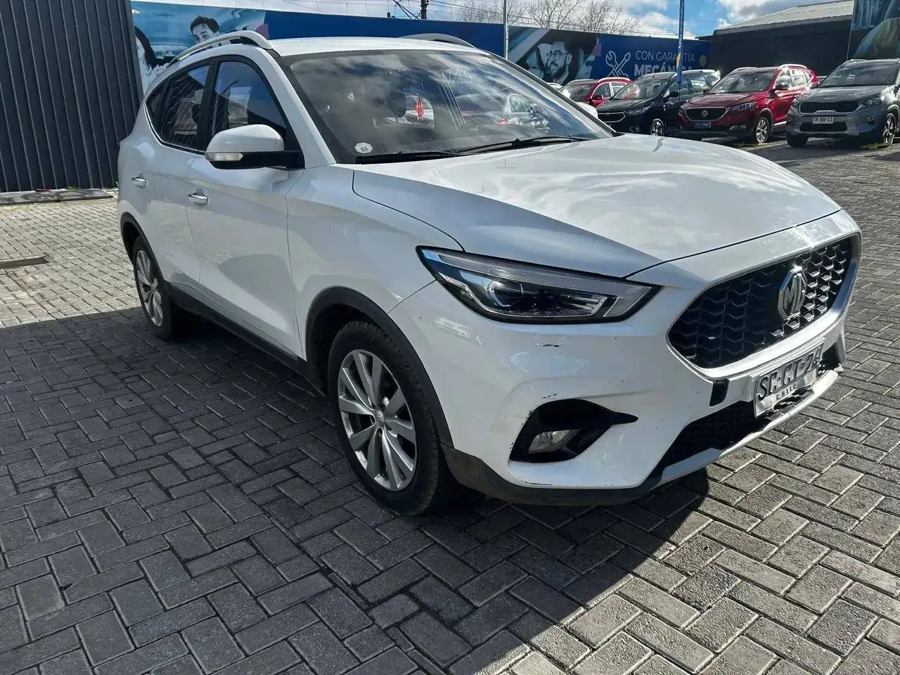 MG