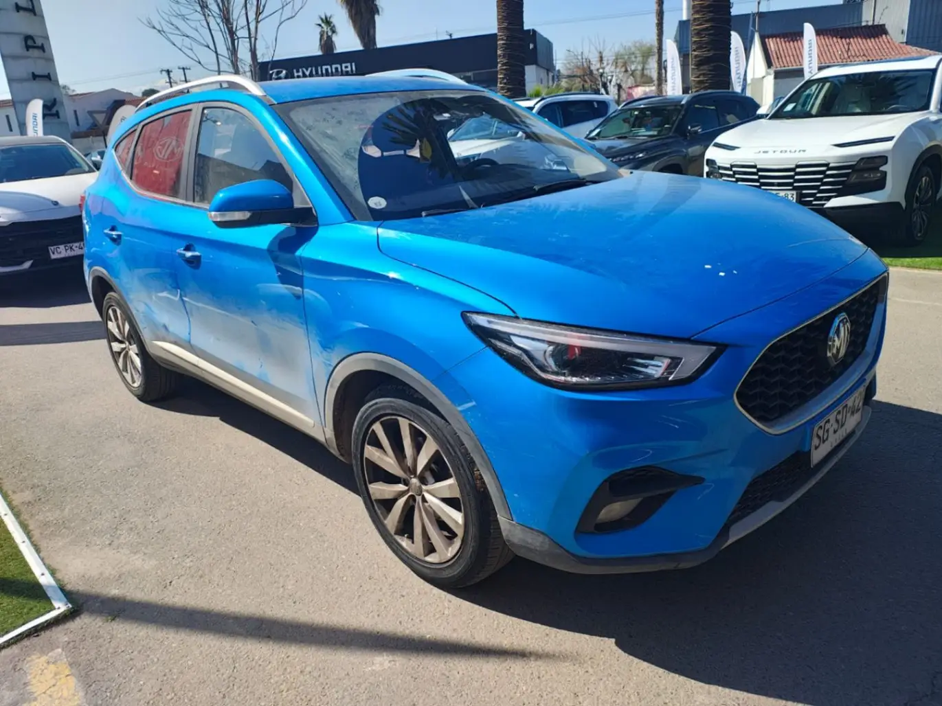 MG