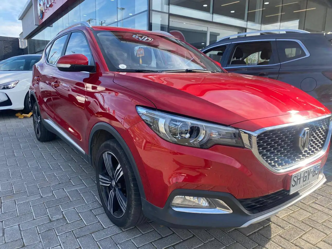 MG