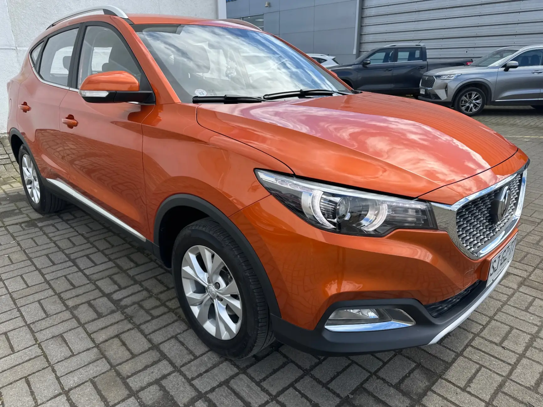 MG