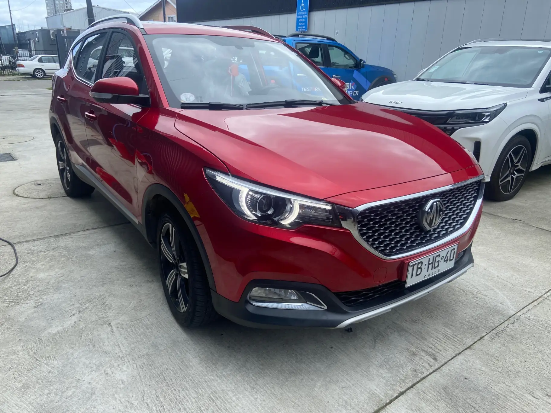 MG