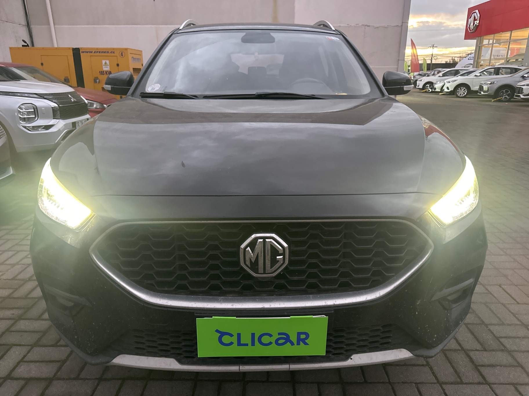 MG