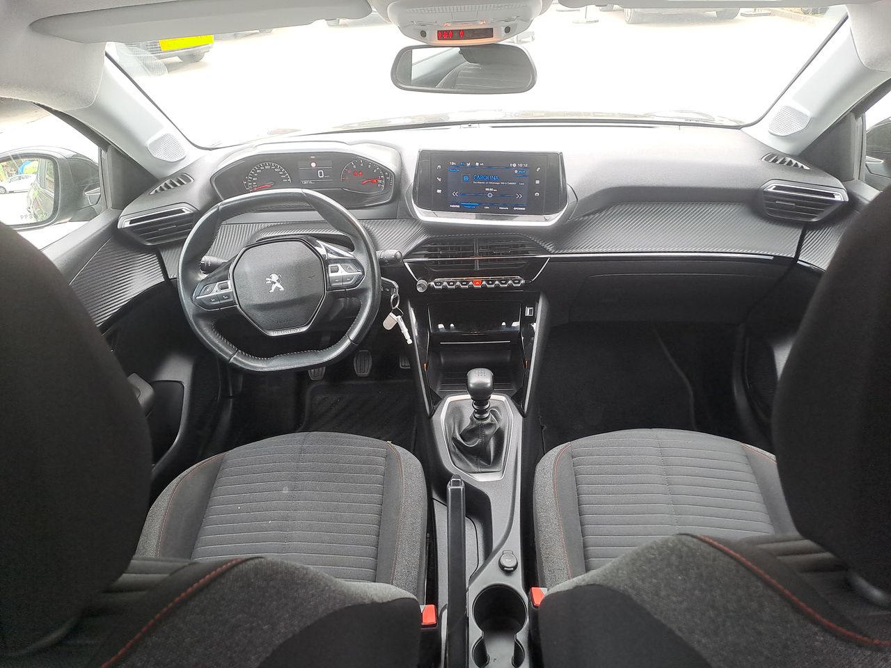 Peugeot 208 — foto 10 de 26