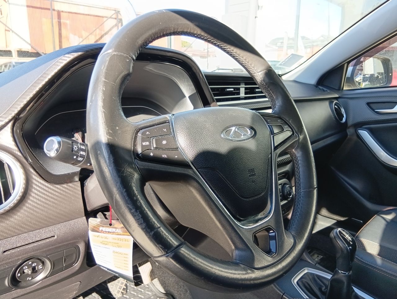 Chery Tiggo 2 — foto 18 de 27