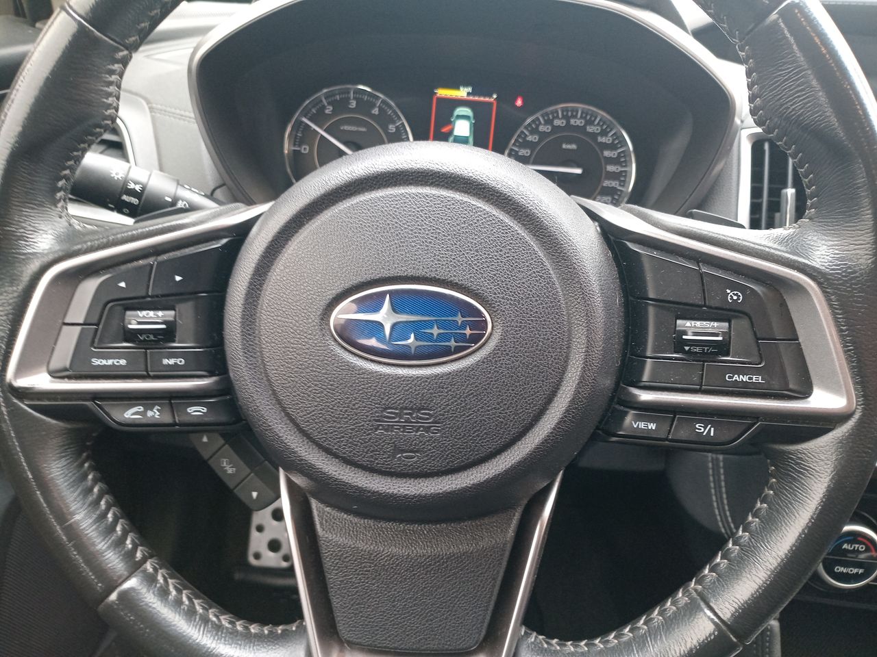 Subaru Impreza — foto 18 de 27